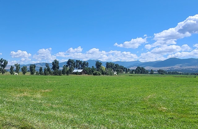 property view of mountains with a rural view