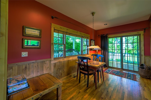 dining space with dark hardwood / wood-style floors