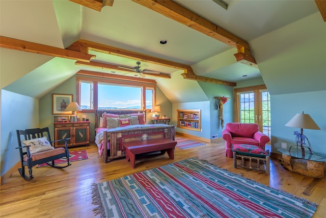 bedroom featuring wood-type flooring and lofted ceiling with beams