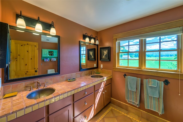 bathroom featuring vanity and tile patterned flooring