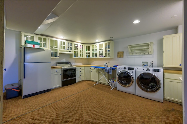 washroom with light carpet and washer and clothes dryer