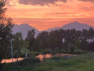 mountain view featuring a water view