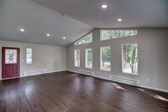 unfurnished living room with a baseboard heating unit and a healthy amount of sunlight