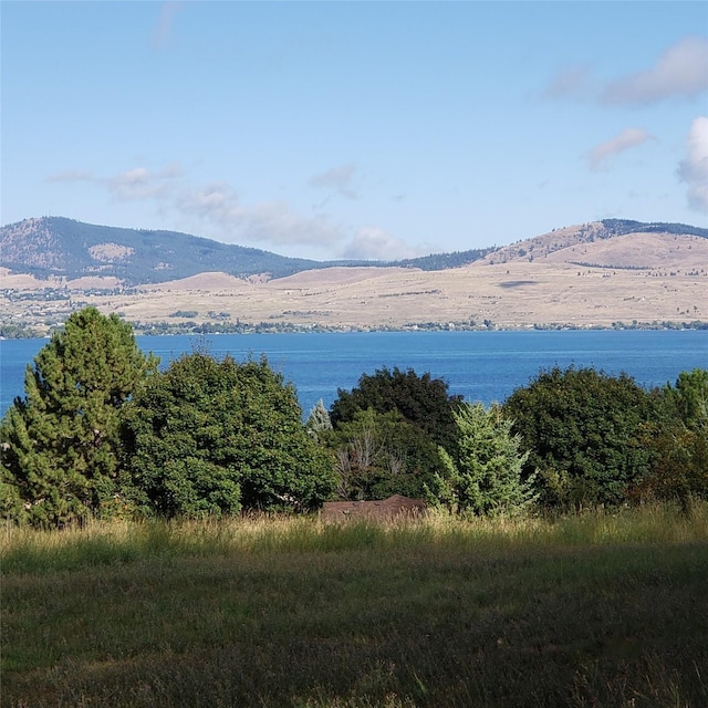 property view of mountains featuring a water view