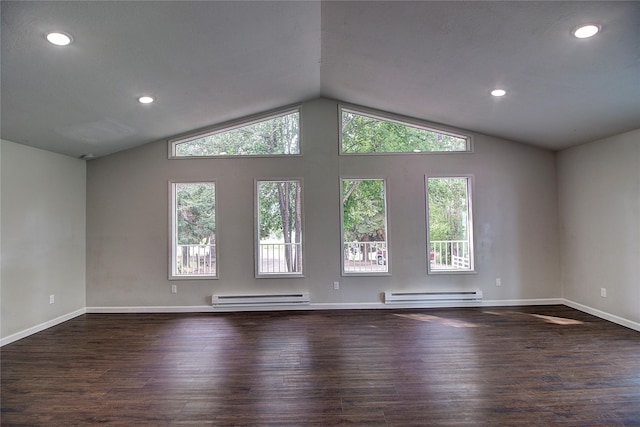 unfurnished living room with lofted ceiling, baseboards, a baseboard heating unit, and wood finished floors