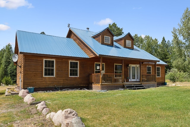 view of front of property with covered porch and a front lawn