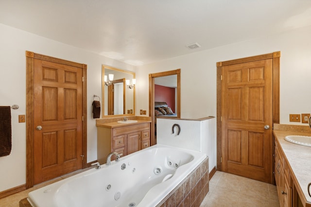 bathroom with vanity and tile patterned flooring