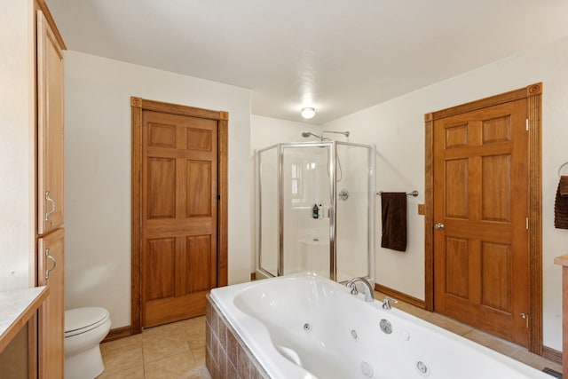 full bathroom featuring vanity, toilet, separate shower and tub, and tile patterned flooring