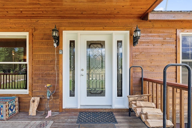 doorway to property with a porch