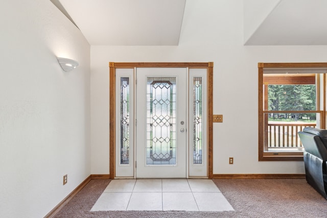 view of carpeted foyer