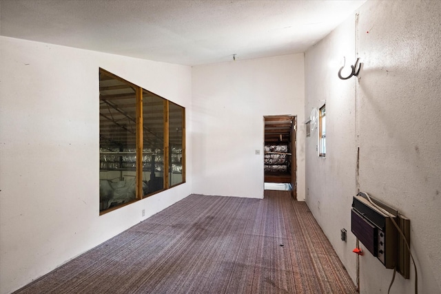 159 Sylvan Dr, Bigfork, MT 59911 - corridor featuring carpet floors and heating unit