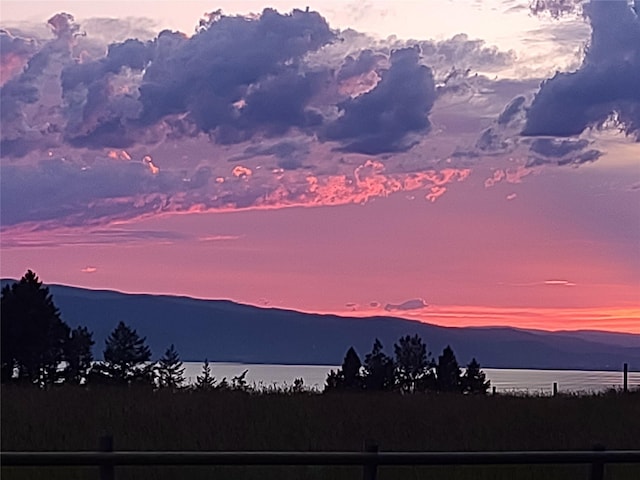 159 Sylvan Dr, Bigfork, MT 59911 - view of mountain backdrop with a large body of water