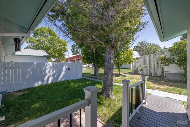 view of yard with a wooden deck