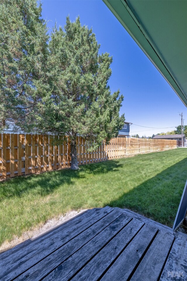 view of yard with a wooden deck