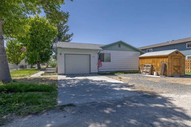 ranch-style home featuring a garage