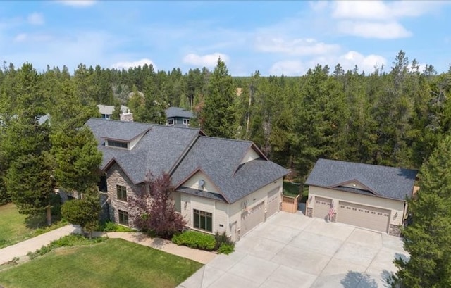 517 Cascade Ave, West Yellowstone, MT 59758 - aerial view featuring a view of trees