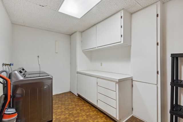 laundry area featuring cabinet space and separate washer and dryer