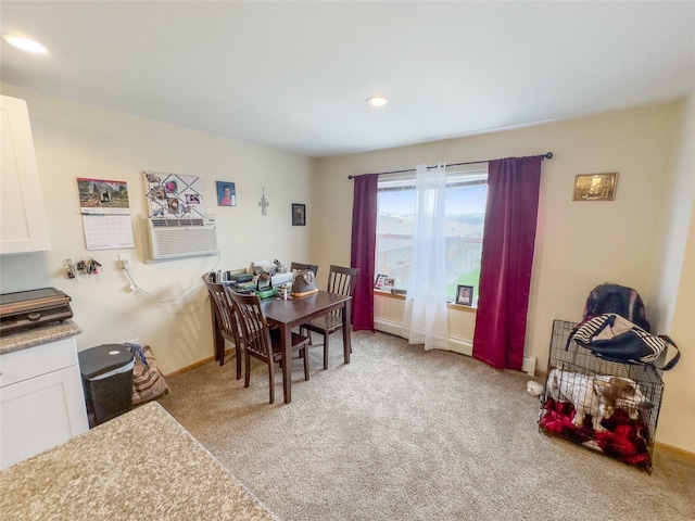 dining area with light colored carpet