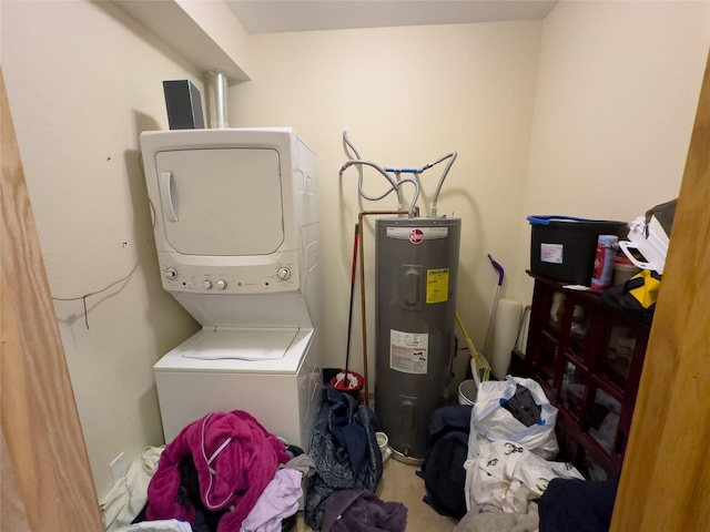 clothes washing area with stacked washer / drying machine and electric water heater