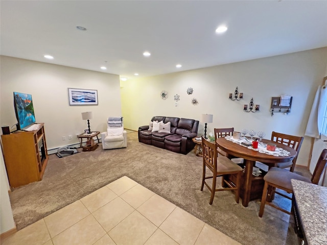 carpeted living room featuring a baseboard radiator