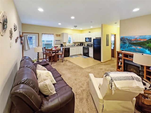 living room featuring light carpet