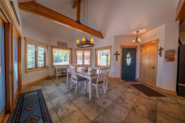 tiled dining room with high vaulted ceiling, a notable chandelier, and beamed ceiling