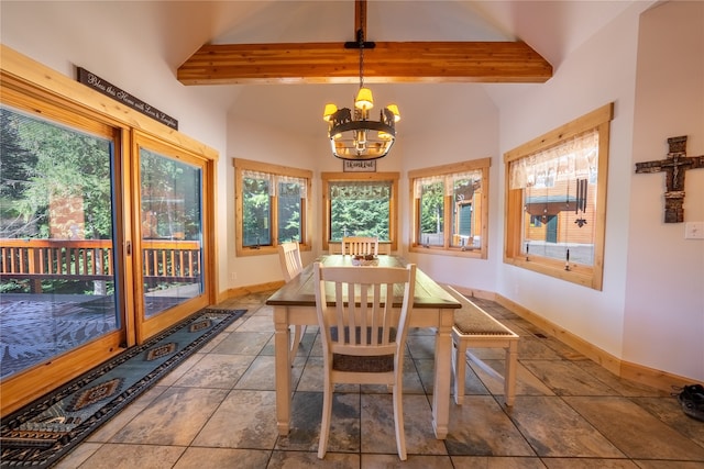 tiled dining space featuring an inviting chandelier and beamed ceiling