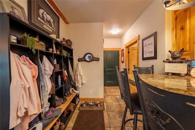 mudroom featuring light tile patterned floors