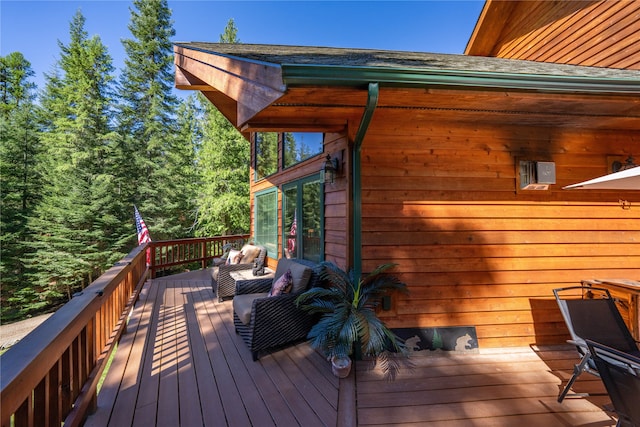 wooden deck with outdoor lounge area