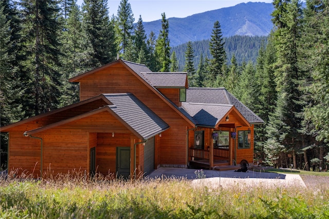 log home featuring a mountain view