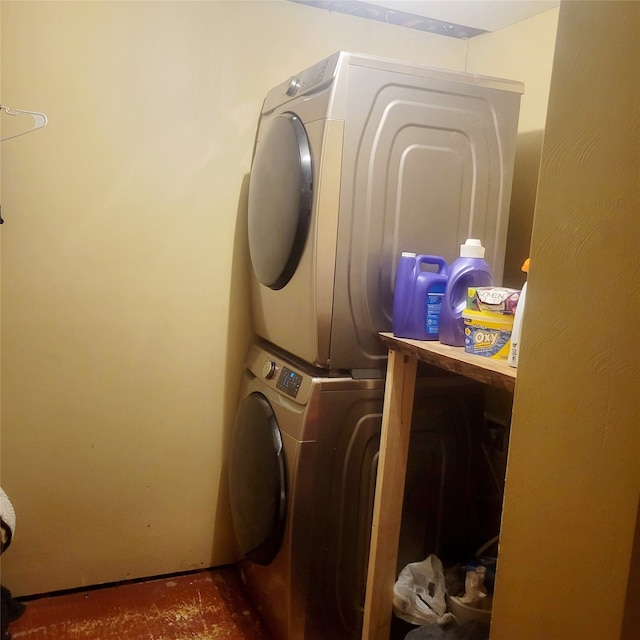 washroom with stacked washer / dryer