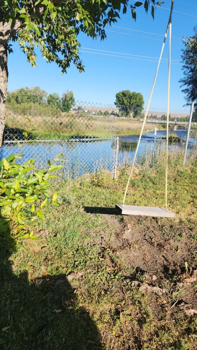 view of yard with a water view