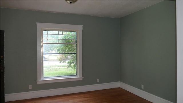 empty room featuring hardwood / wood-style floors