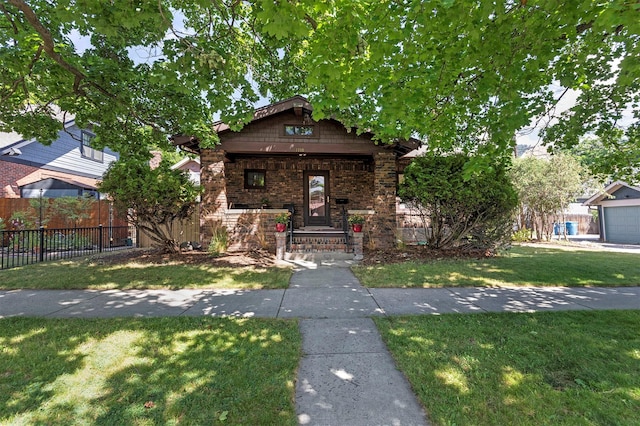 view of front facade with a front yard