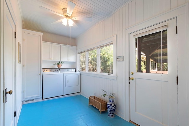 washroom featuring cabinets, ceiling fan, and independent washer and dryer