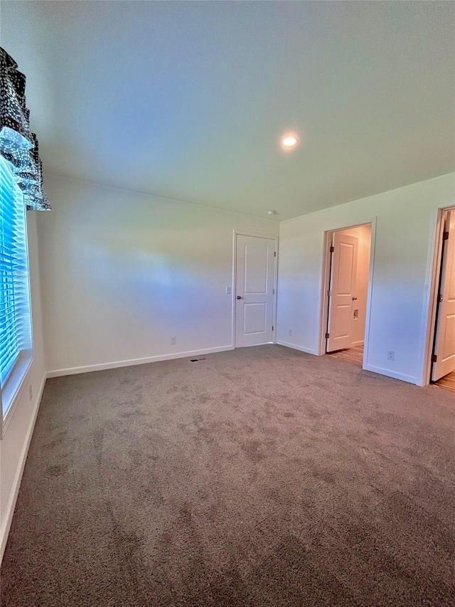 empty room with carpet floors