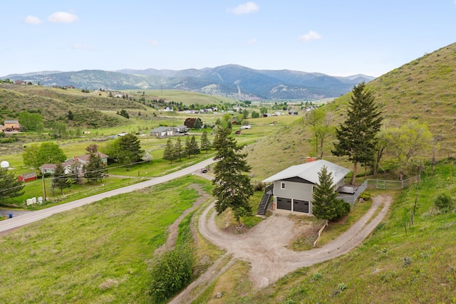 bird's eye view with a rural view and a mountain view