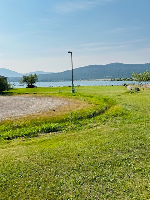 view of mountain feature featuring a water view