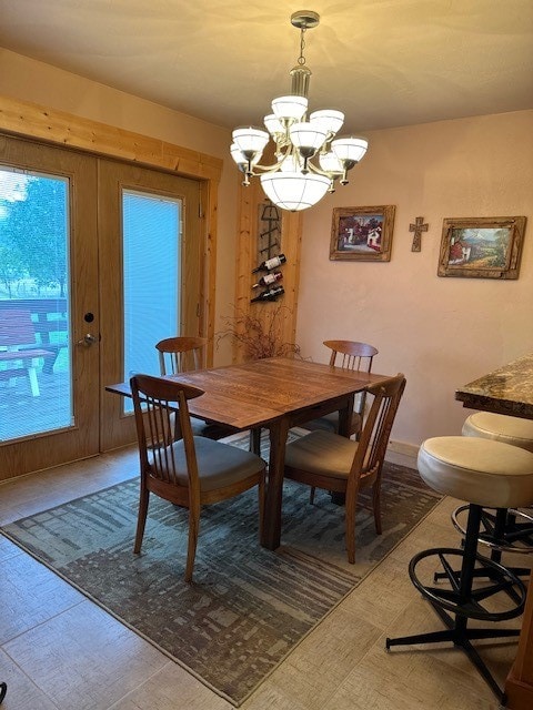 dining space with a chandelier