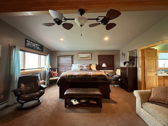 carpeted bedroom with vaulted ceiling and ceiling fan