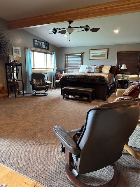 bedroom featuring vaulted ceiling with beams, hardwood / wood-style flooring, and ceiling fan