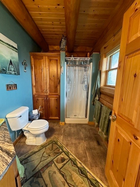 bathroom featuring beam ceiling, wood-type flooring, walk in shower, and toilet