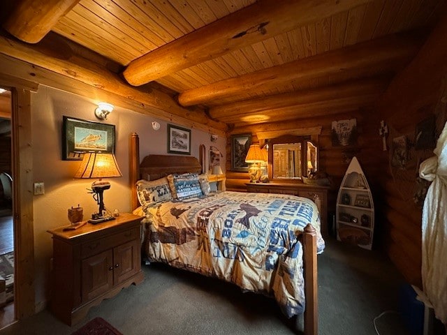 bedroom featuring beamed ceiling and wood ceiling