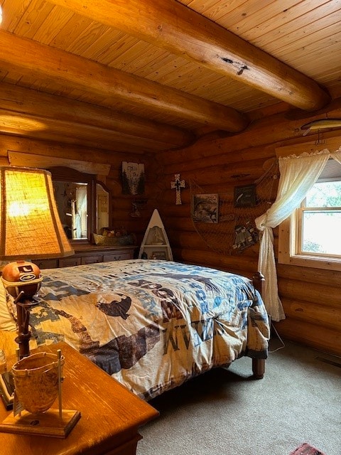 bedroom with beamed ceiling, rustic walls, and wooden ceiling