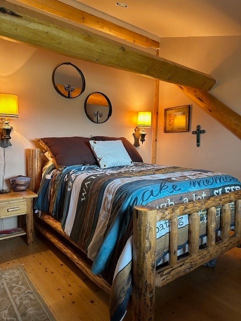 bedroom featuring hardwood / wood-style floors