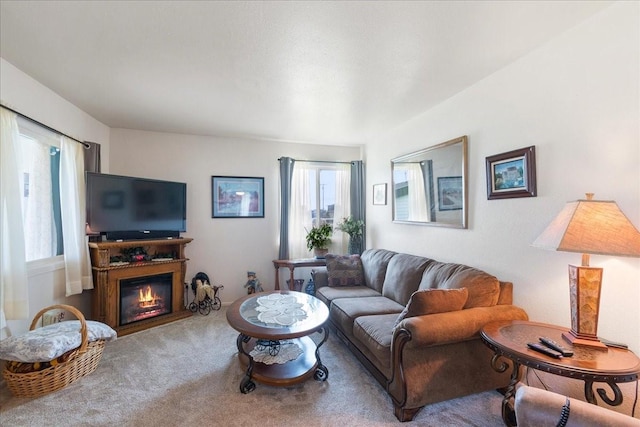 living room with carpet flooring and a wealth of natural light