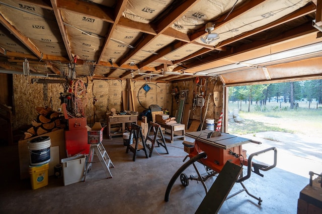 garage with a workshop area