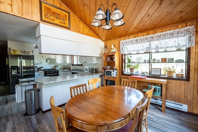 dining space with dark wood-style floors, vaulted ceiling, wooden ceiling, and an inviting chandelier