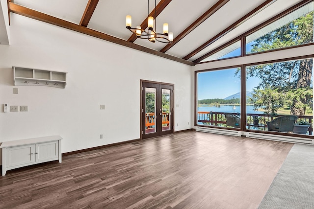 548 W Village Dr, Bigfork, MT 59911 - unfurnished room featuring high vaulted ceiling, a chandelier, french doors, a water view, and beam ceiling