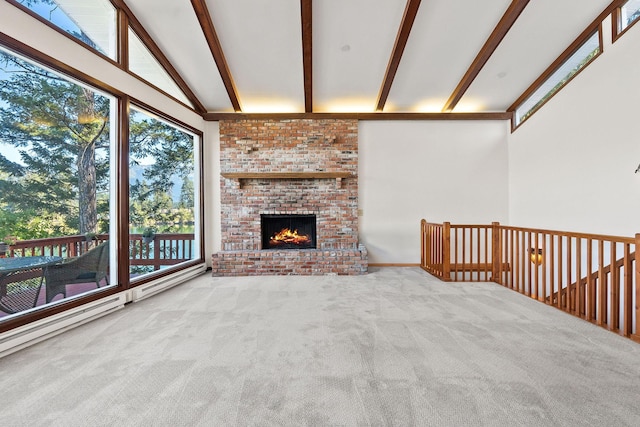 unfurnished living room with high vaulted ceiling, beamed ceiling, carpet, and a brick fireplace